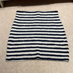 Cutest mini skirt, classic navy blue and white stripped. Full length back zipper